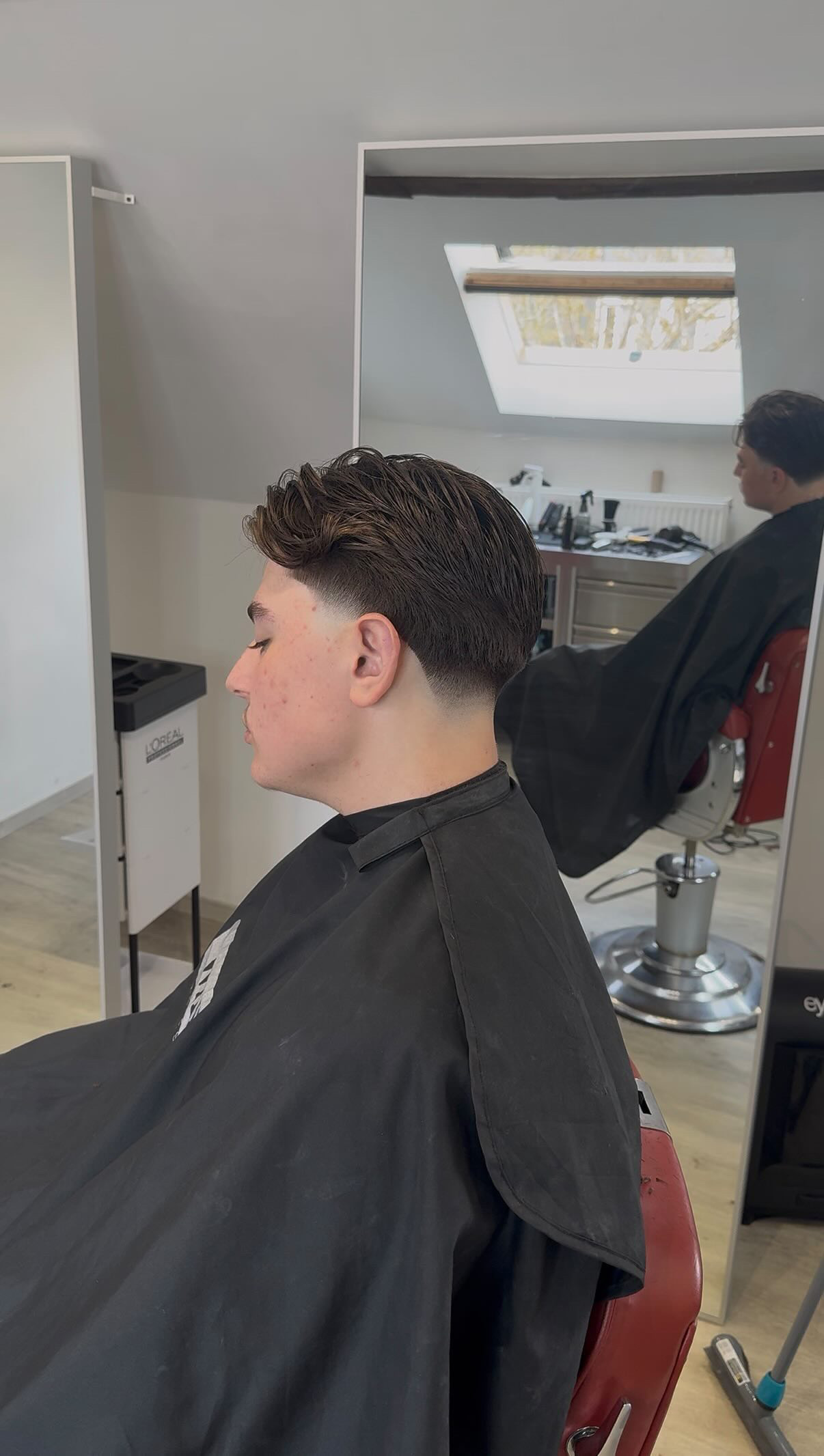Taper fade met gestyled haar