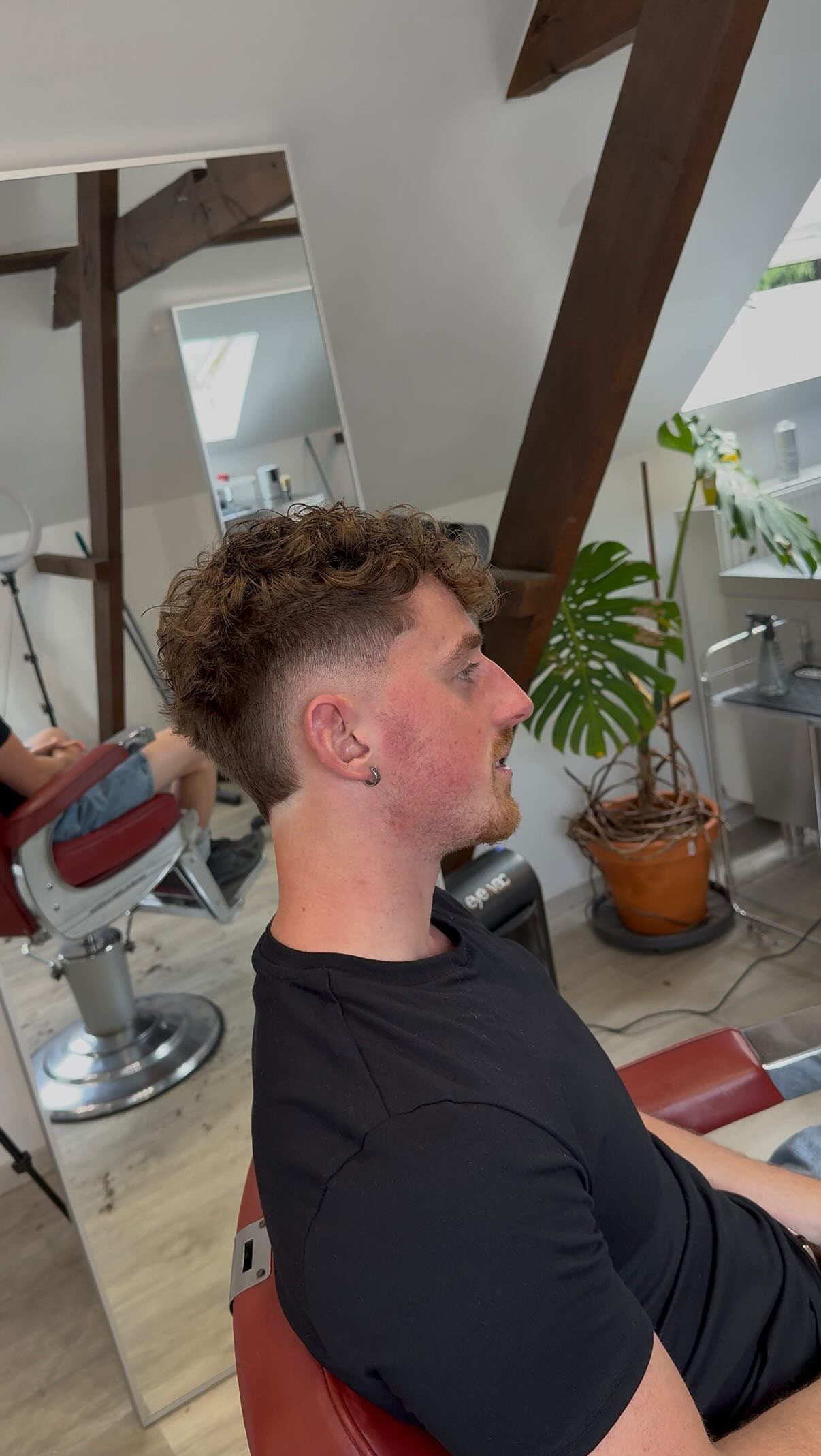 Curly fade na knipbeurt